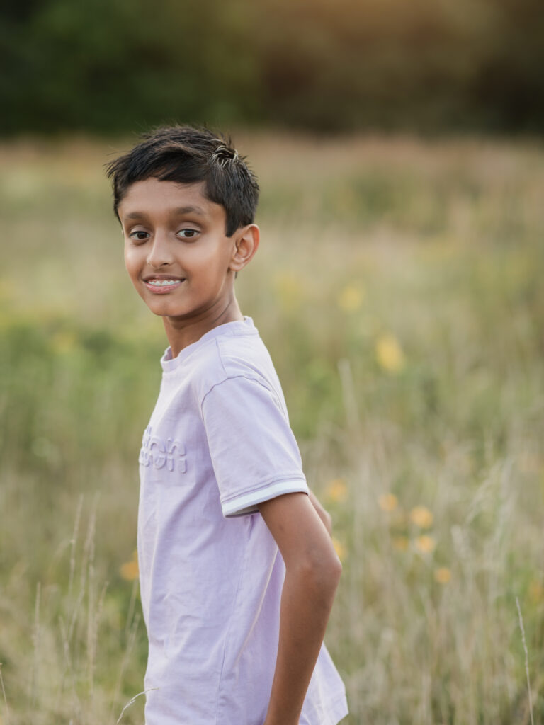 portrait of boy in park for family photo session