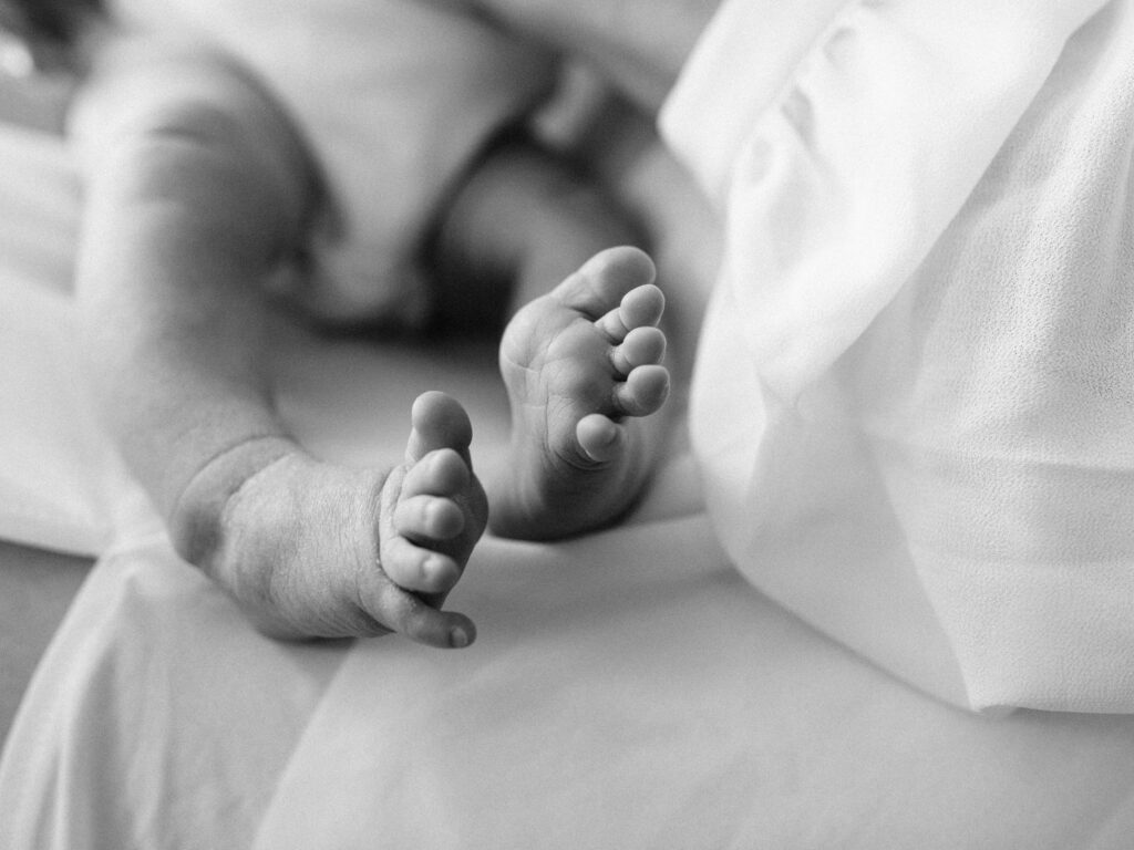 photo of newborn baby girl feet