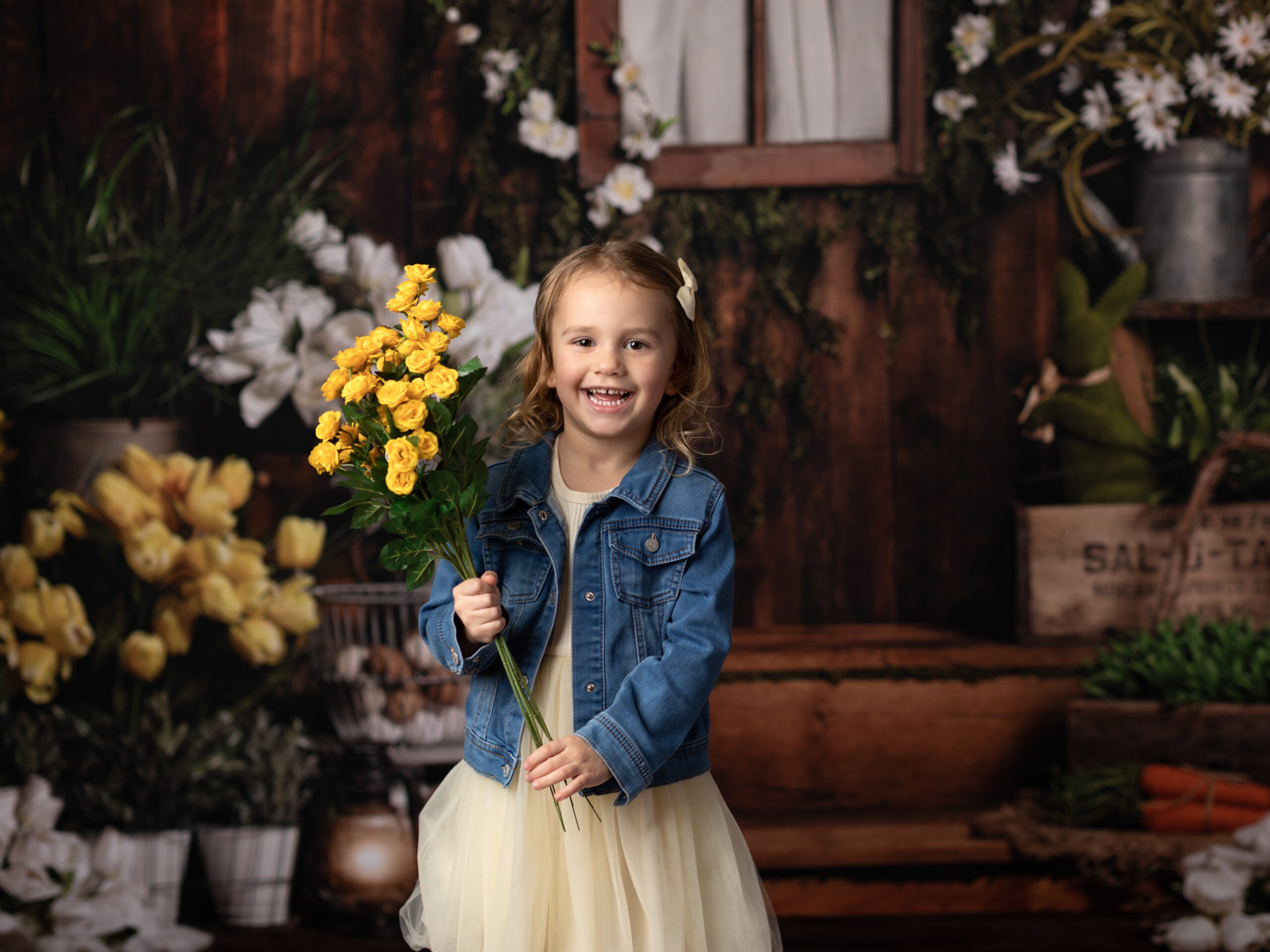 girl holding yellow flowers for spring mini photos Spring Family Outfits