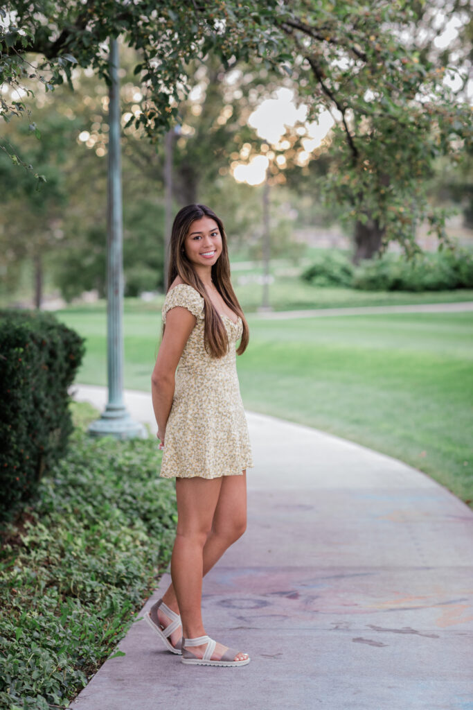 girl in yellow dress psong for senior portraits