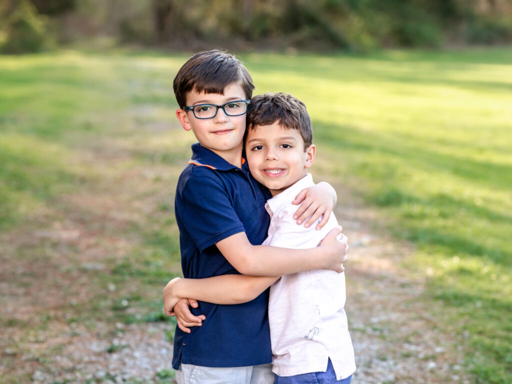 brothers hugging for family photos