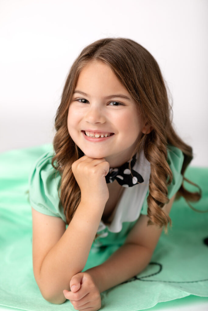girl in tap dance costume posing for dance portraits