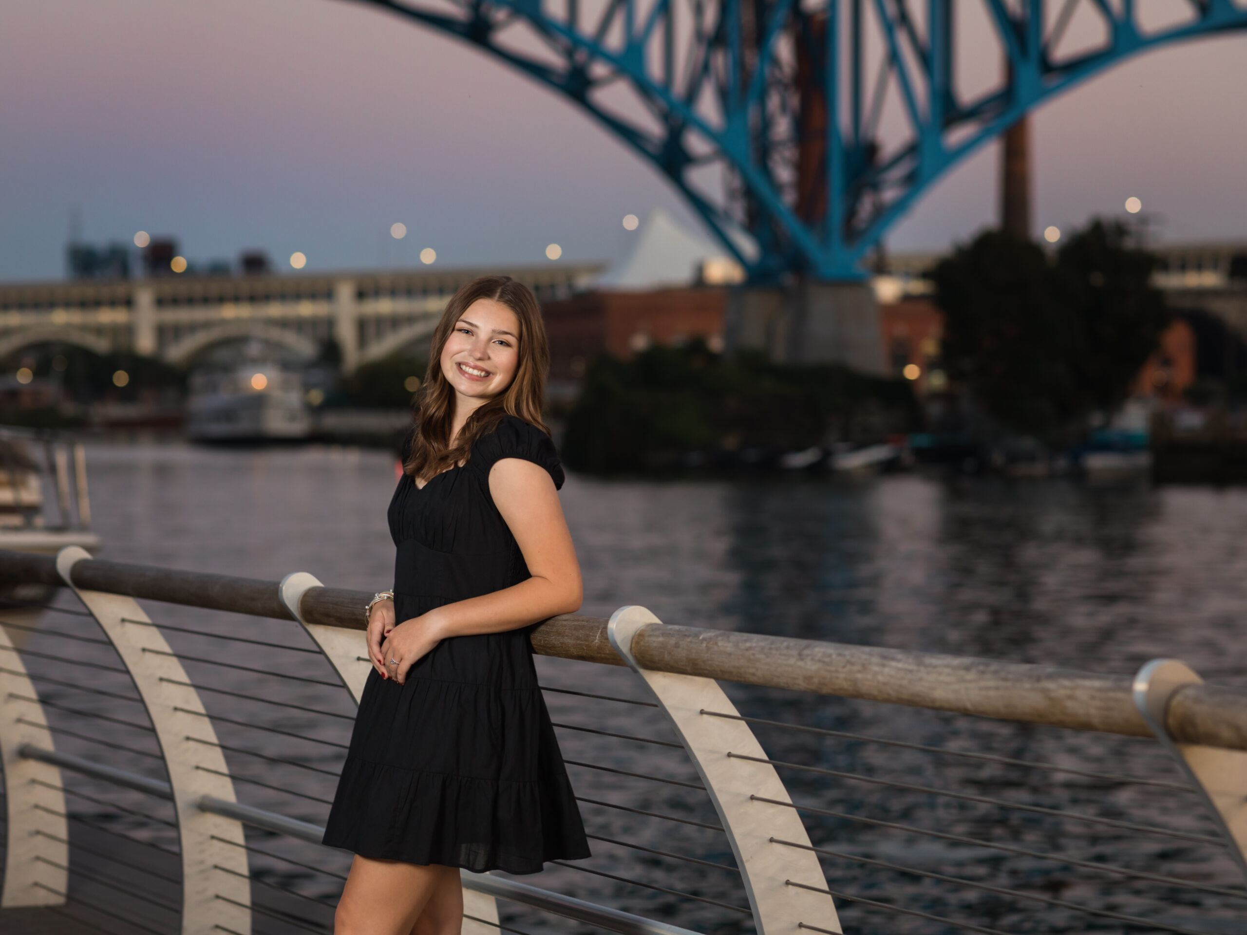senior girl posing on the cleveland boardwalk Cleveland photoshoot locations