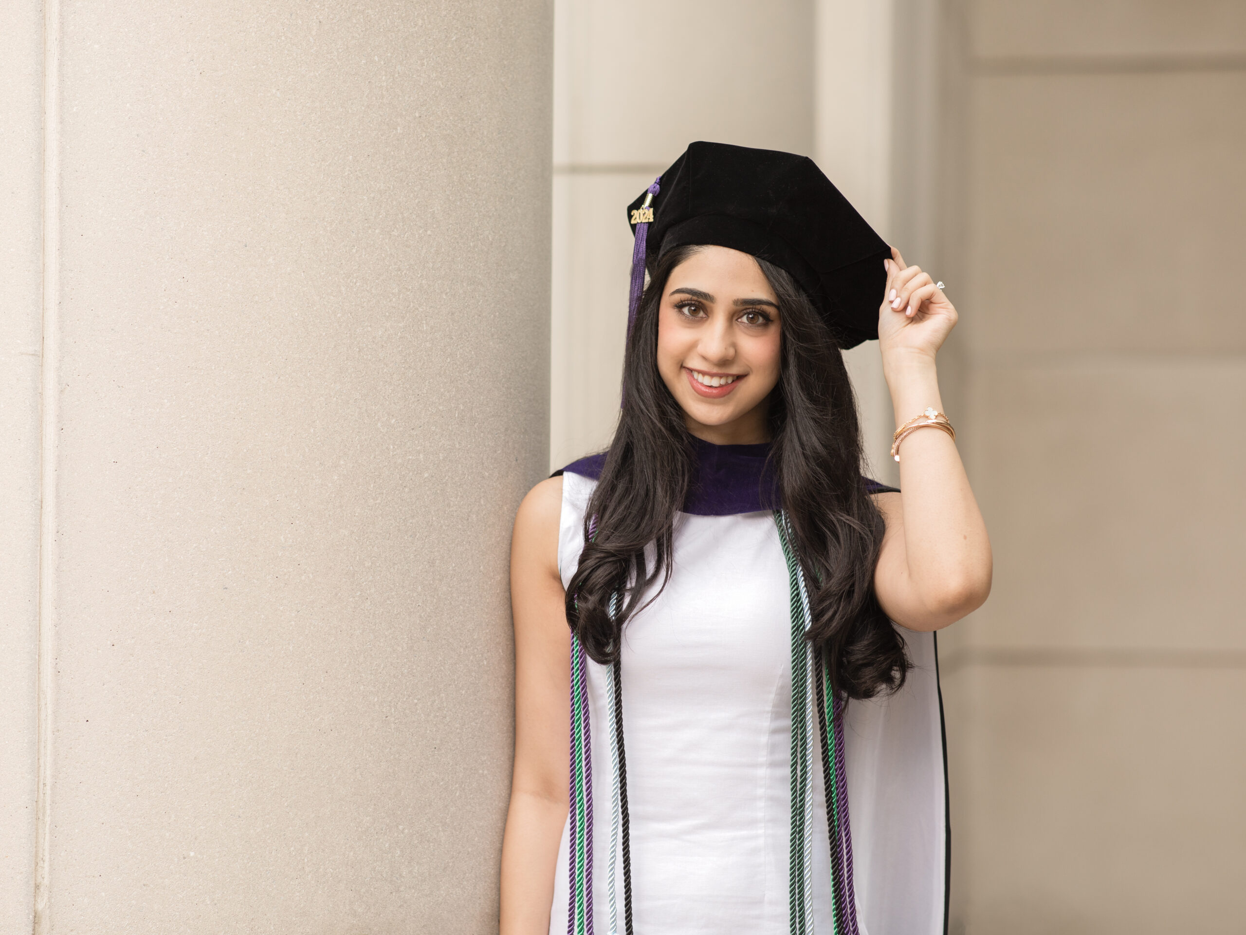 girl wearing graduation cap for photoshoot at Cleveland State University College of Law