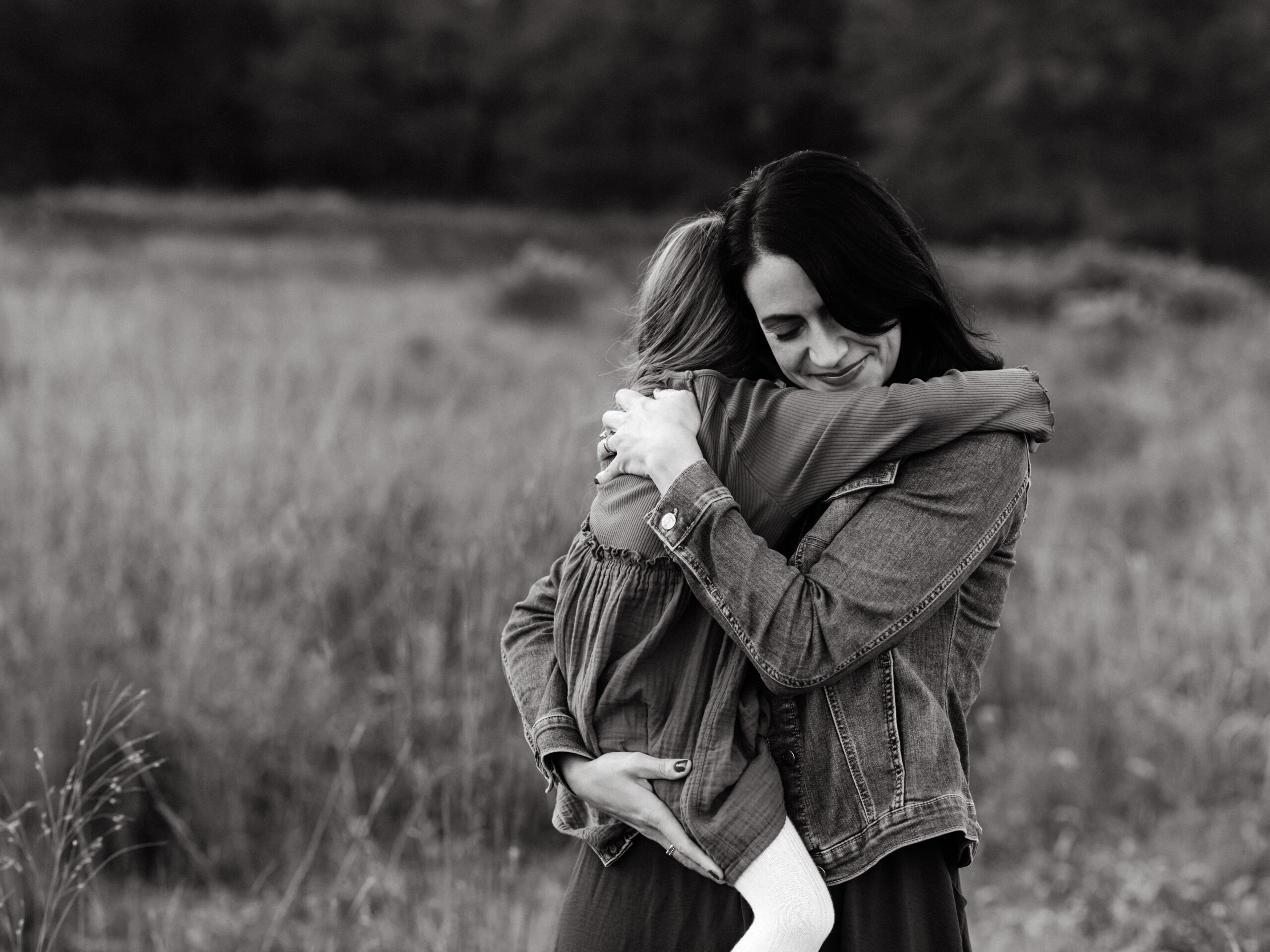 mom hugging daughter for family photos at park Things To Do In Medina Ohio