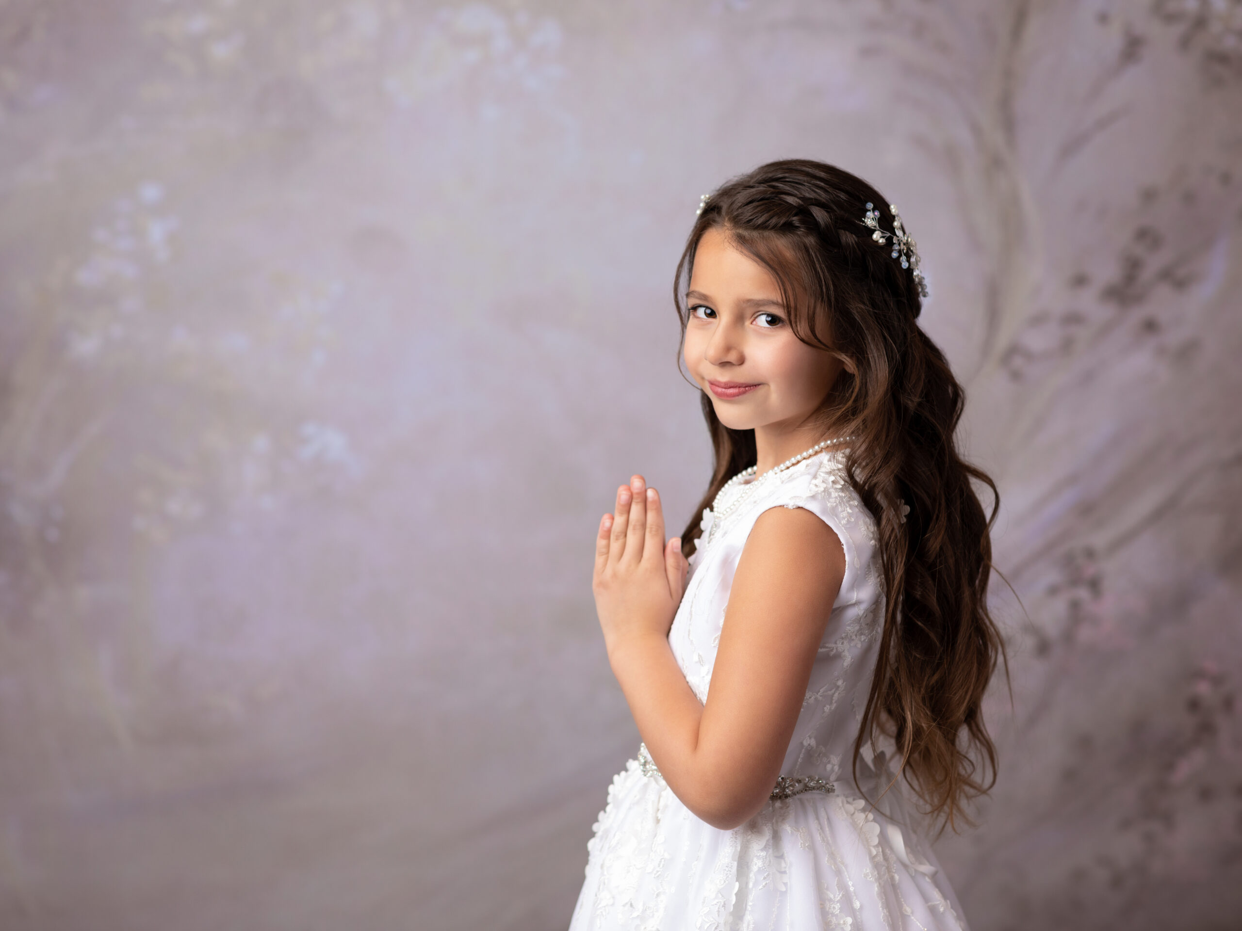 girl posing in first communion dress Cleveland First Communion Photography